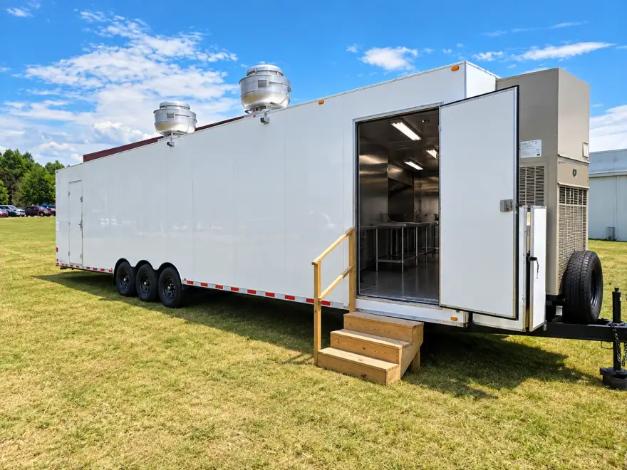 Mobile kitchen for rent parked at the entrance of a commercial site